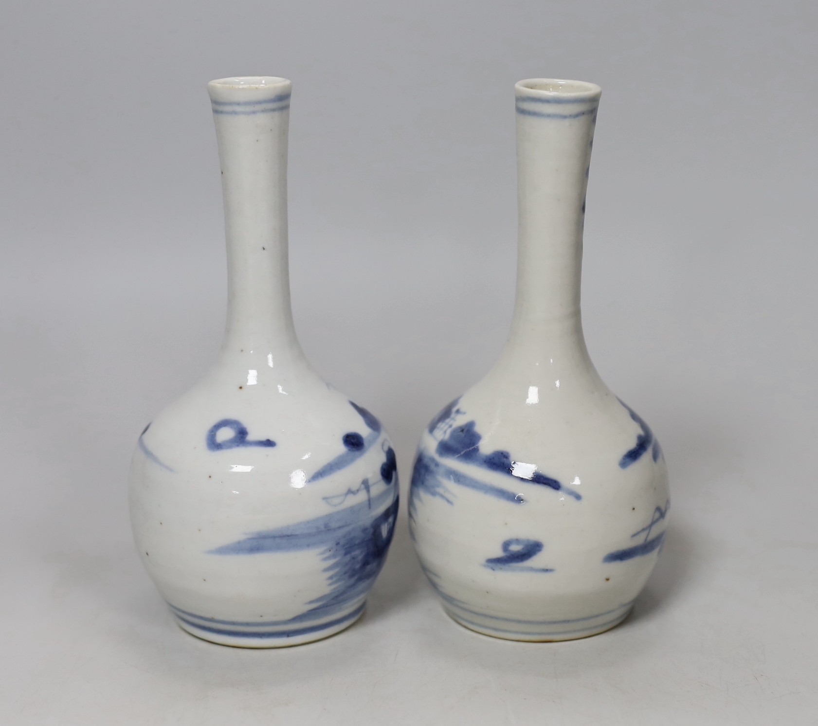 A pair of 19th century Chinese blue and white bottle vases, 16cm